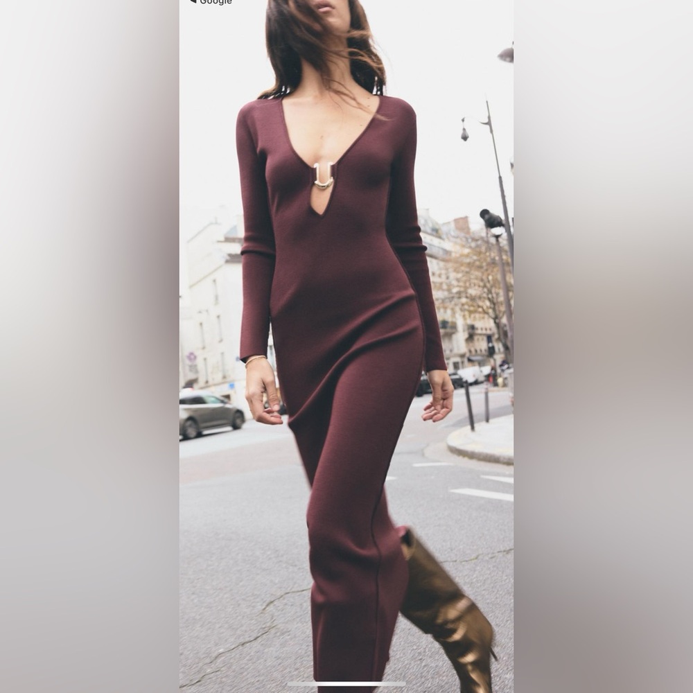 Knit dress with golden appliqué